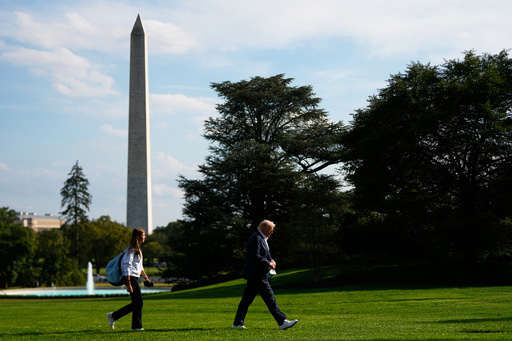President Donald Trump, right, arrives with his granddaughter Kai Trump at the White House, Friday, Sept. 26, 2025, in Washington. (AP Photo/Julia Demaree Nikhinson) President Donald Trump, right, arrives with his granddaughter Kai Trump at the White House, Friday, Sept. 26, 2025, in Washington. (AP Photo/Julia Demaree Nikhinson)