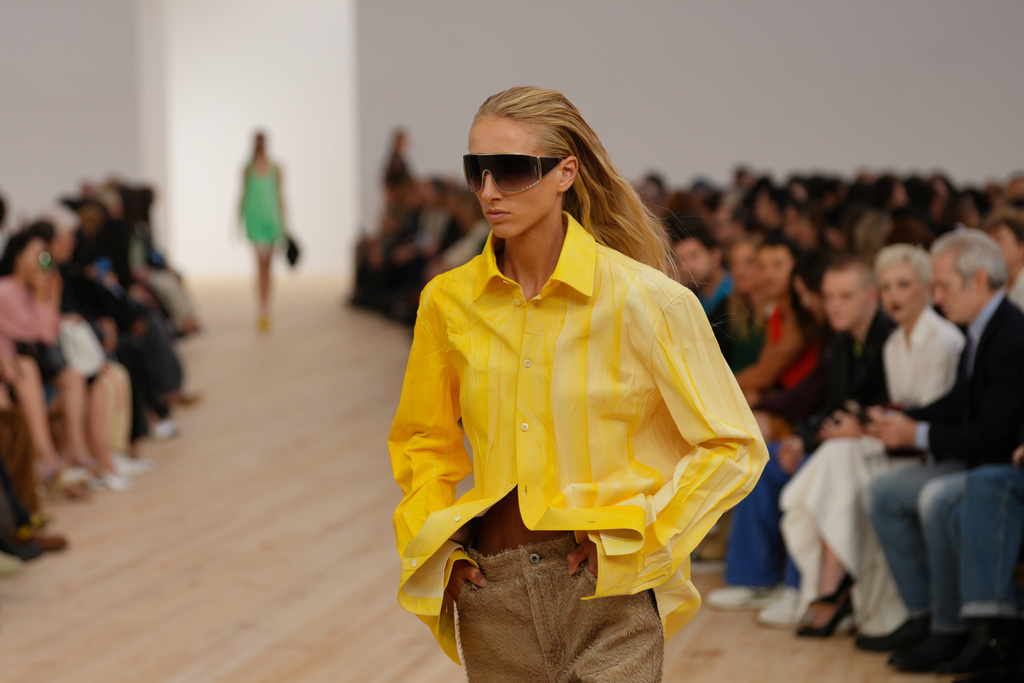 A model wears a creation as part of the Loewe Spring/Summer 2026 collection presented in Paris, Friday, Oct. 3, 2025. (AP Photo/Aurelien Morissard)