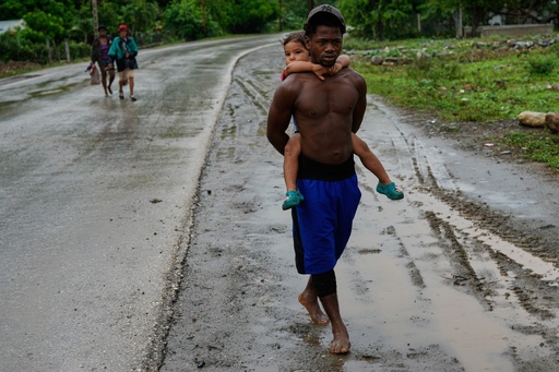 People evacuate before the the arrival of Hurricane Melissa in Canizo, a community in Santiago de Cuba, Tuesday, Oct. 28, 2025. (AP Photo/Ramón Espinosa) People evacuate before the the arrival of Hurricane Melissa in Canizo, a community in Santiago de Cuba, Tuesday, Oct. 28, 2025. (AP Photo/Ramón Espinosa)