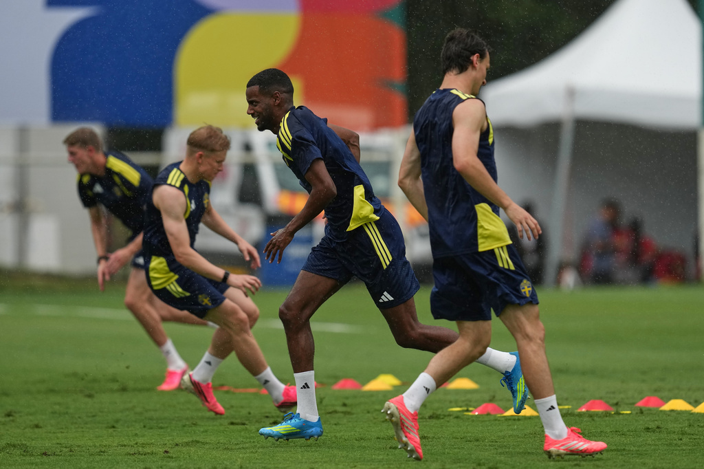 Members of the Sweden national soccer warm up during a training session in Santiago Nuevo Leon, Mexico, Saturday, June 13, 2026, ahead of the FIFA World Cup soccer tournament. (AP Photo/Dolores Ochoa)