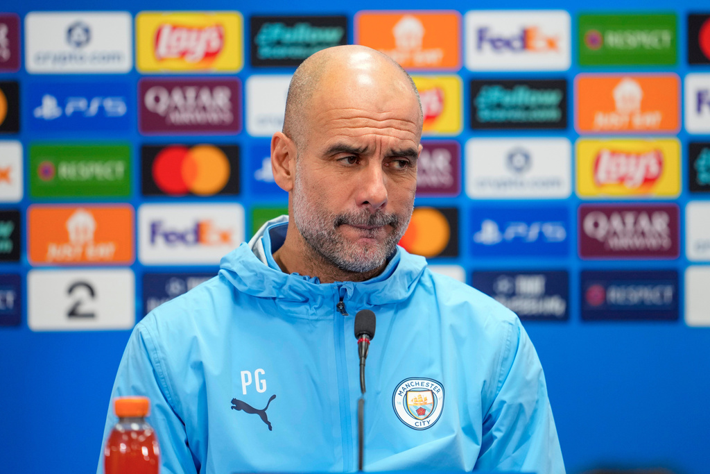 Manchester City's head coach Pep Guardiola attends a press conference in Bodo, Norway, Monday, Jan. 19, 2025, ahead the Champions League soccer match against Bodø/Glimt on Tuesday. (Fredrik Varfjell/NTB Scanpix via AP)