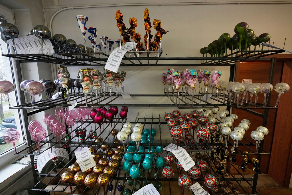 The hand-made Christmas baubles are prepared at GlitterLab in Czestochowa, southern Poland, on Nov. 21, 2025. (AP Photo/Czarek Sokolowski)
