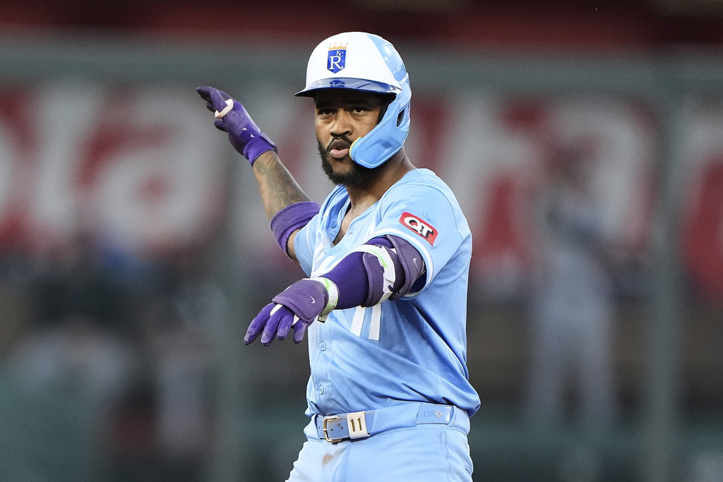 Kansas City Royals' Maikel Garcia celebrates on second after hitting a two-run double during the fifth inning of a baseball game against the Chicago White Sox, Saturday, Aug. 16, 2025, in Kansas City, Mo. (AP Photo/Charlie Riedel)