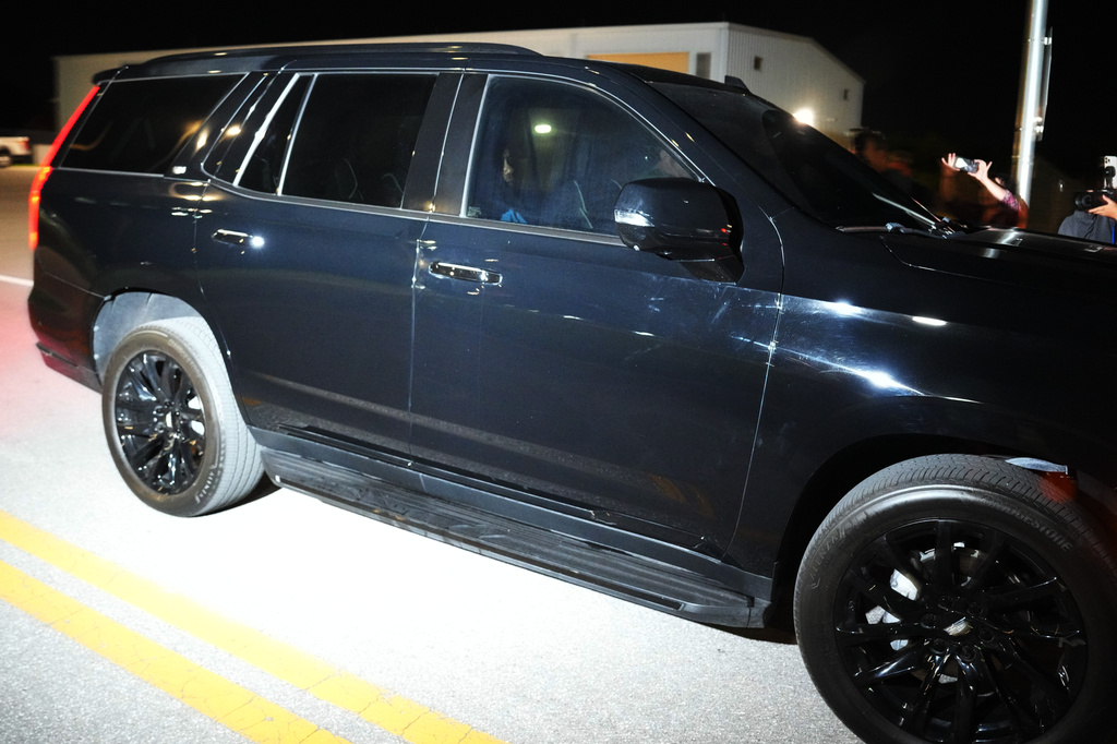 Tiger Woods leaves the Martin County Sheriff's Office jail facility following his involvement in a car crash where he was arrested on a DUI charge on Friday, March 27, 2026 (AP Photo/Jim Rassol)