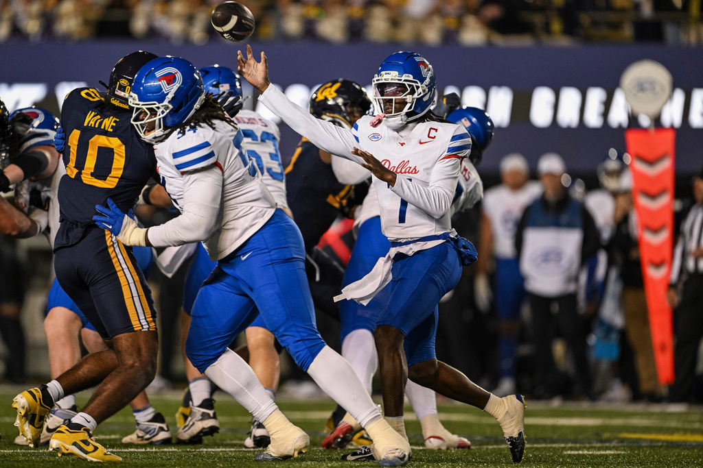 SMU quarterback Kevin Jennings throws the ball during the first half of an NCAA college football game against California, Saturday, Nov. 29, 2025, in Berkeley, Calif. (AP Photo/Justine Willard)