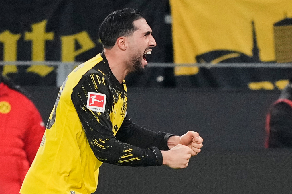Dortmund's Emre Can celebrates after he scored his side's decisive third goal from the penalty spot during the German Bundesliga soccer match between Borussia Dortmund and St. Pauli in Dortmund, Germany, Saturday, Jan. 17, 2026. (AP Photo/Martin Meissner)