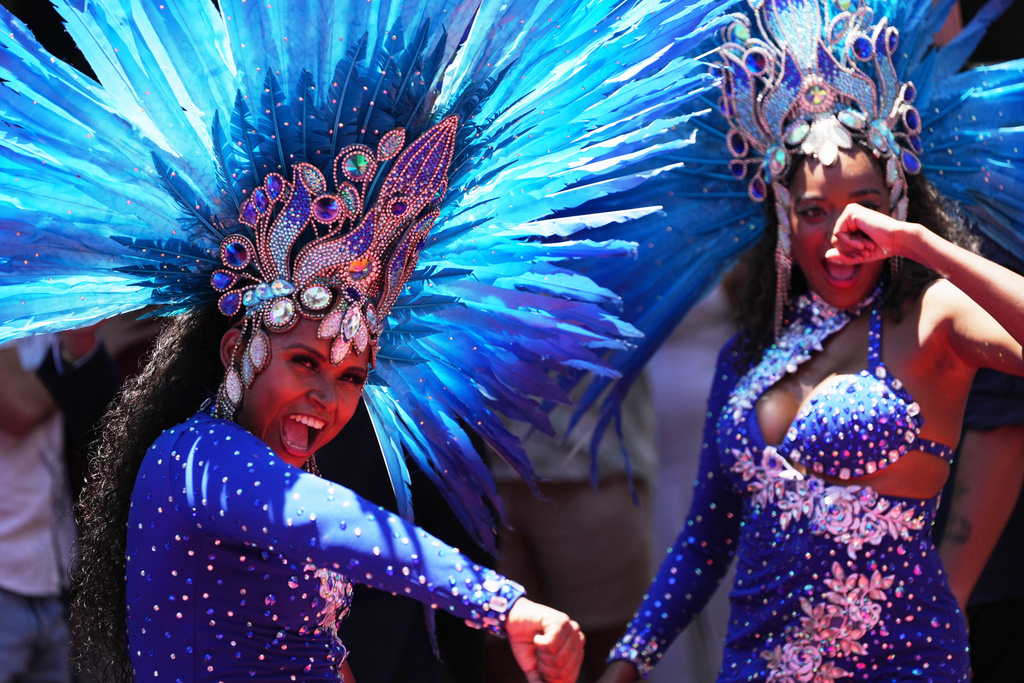 Performers attend a ceremony officially kicking off Carnival in Rio de Janeiro, Friday, Feb. 13, 2026. (AP Photo/Silvia Izquierdo)