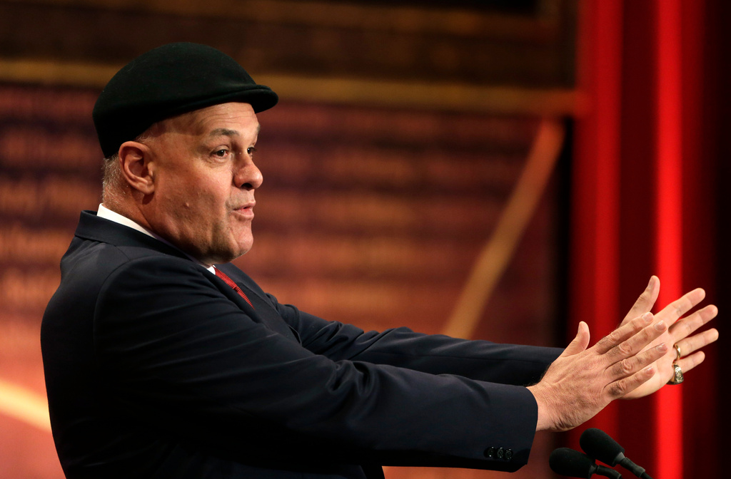 FILE - Inductee Oscar Schmidt, of Brazil, speaks during the enshrinement ceremony for the 2013 class of the Naismith Memorial Basketball Hall of Fame at Symphony Hall in Springfield, Mass., Sept. 8, 2013. Schmidt, whom his Brazil compatriots know as the “Holy Hand,” died. Friday, April 17, 2026. He was 68. (AP Photo/Steven Senne, File)