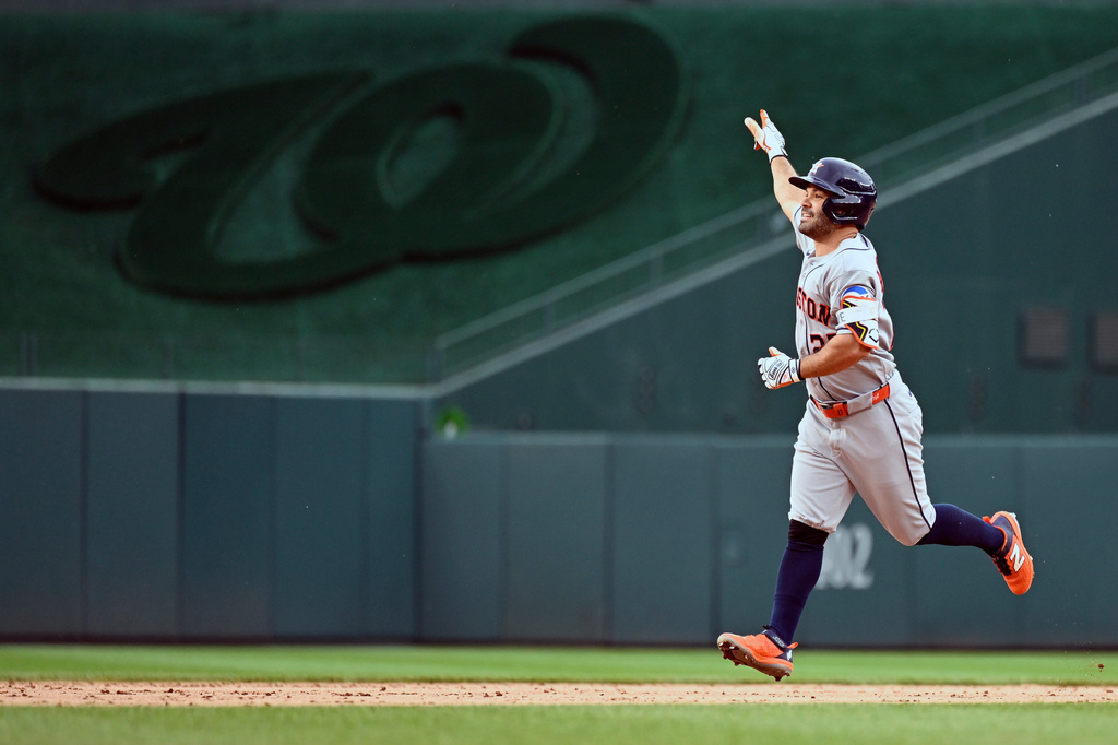 Houston Astros' Jose Altuve runs the bases after hiting a three-run home run during the second inning of a baseball game against the Washington Nationals, Monday, July 6, 2026, in Washington. (AP Photo/John McDonnell)