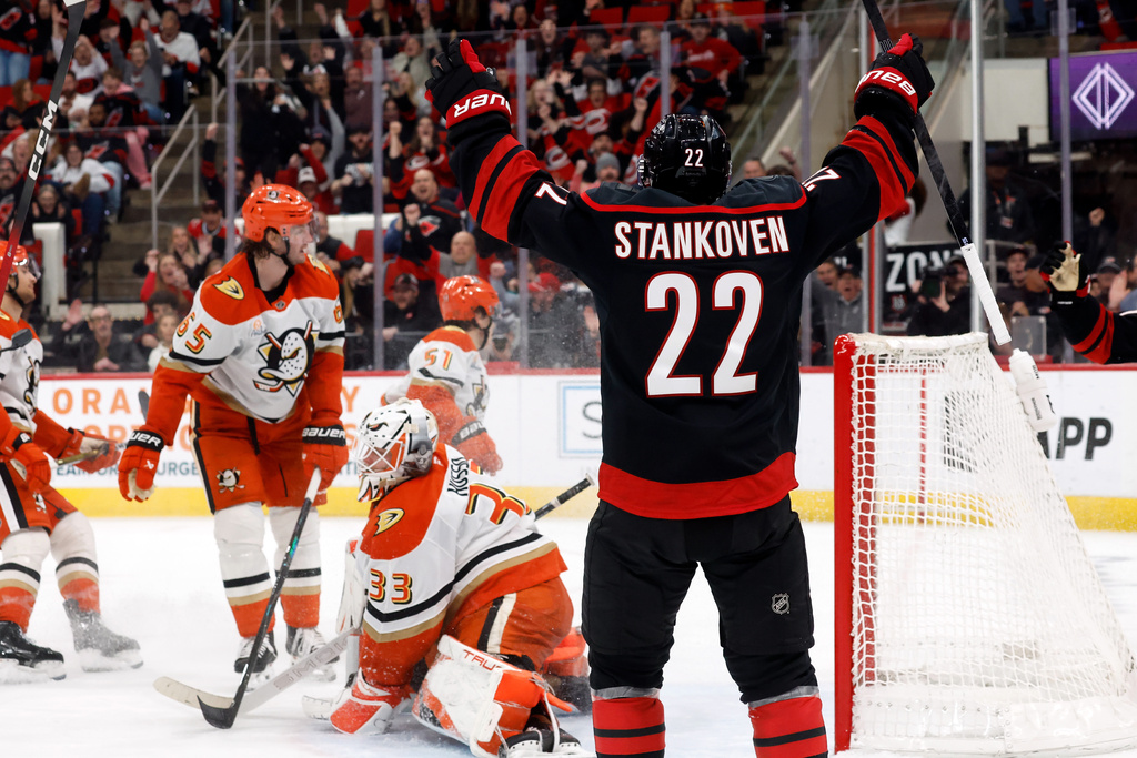 Carolina Hurricanes' Logan Stankoven (22) celebrates his goal against the Anaheim Ducks during the second period of an NHL hockey game in Raleigh, N.C., Thursday, Jan. 8, 2026. (AP Photo/Karl DeBlaker)