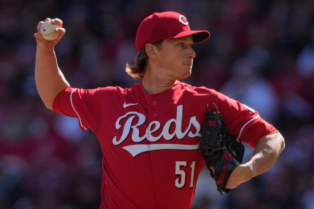 Cincinnati Reds pitcher Brady Singer throws during the first inning of a baseball game against the Boston Red Sox in Cincinnati, Saturday, March 28, 2026. (AP Photo/Carolyn Kaster)
