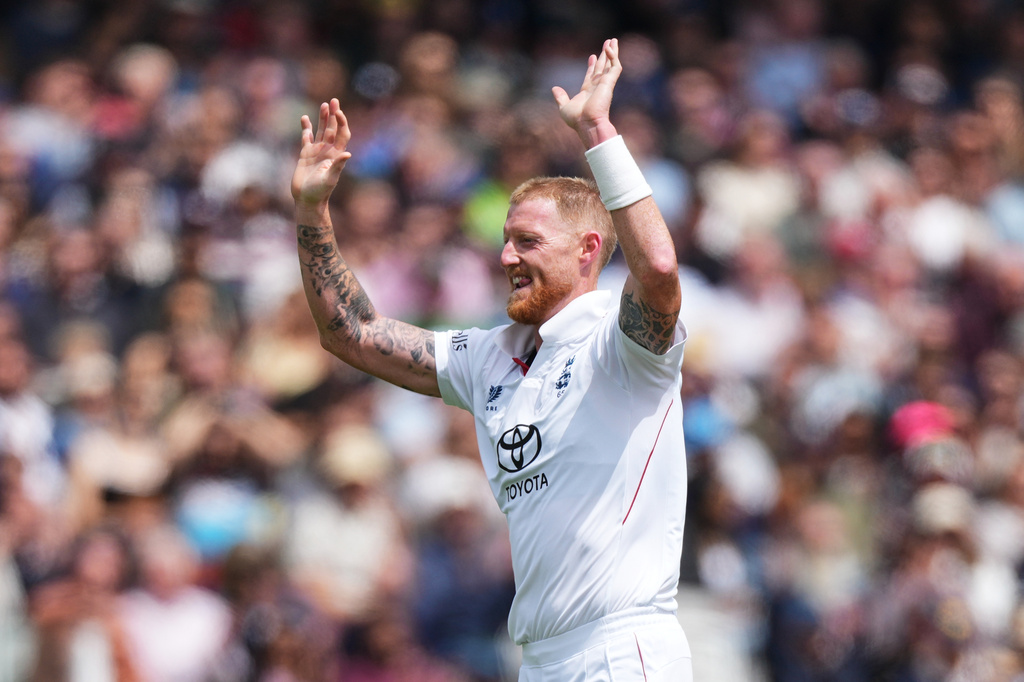 England's captain Ben Stokes celebrates the dismissal of New Zealand's Devon Conway during the fourth day of the Test match between England and New Zealand at Lord's cricket ground in London, Sunday, June 7, 2026. (AP Photo/Kirsty Wigglesworth)