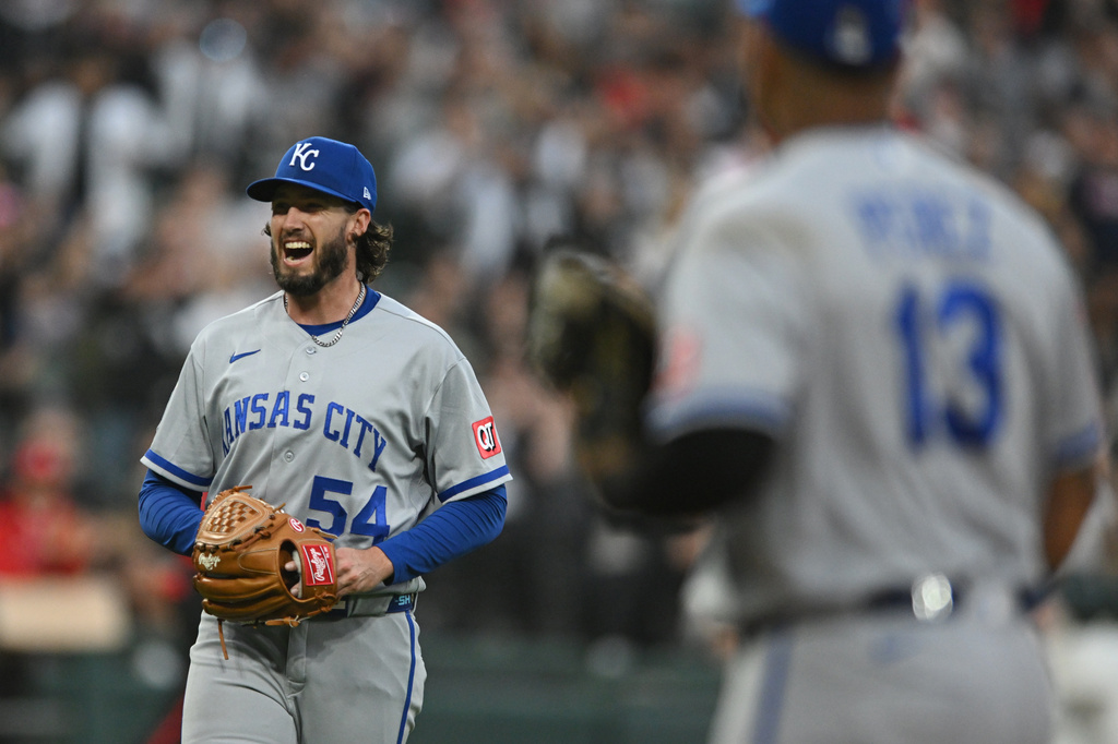 Kansas City Royals relief pitcher Mitch Spence (54) reacts after Chicago White Sox's Kyle Teel scored on a Chase Meidroth single during the third inning of a baseball game in Chicago, Friday, June 26, 2026. (AP Photo/Paul Beaty)