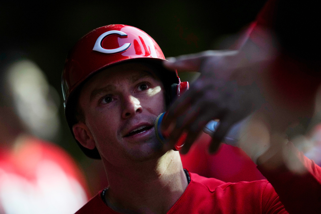 Cincinnati Reds' Matt McLain (9) celebrates after hitting a home run during the fifth nning of a baseball game against the Cincinnati Reds, Wednesday, May 6, 2026, in Chicago. (AP Photo/Erin Hooley)