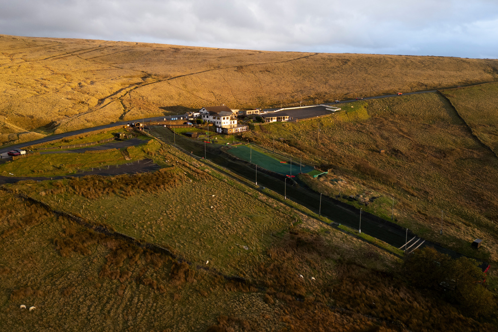 An aerial view of Pendle Ski Club before an inter-club ski meeting at the dry ski slope in Clitheroe, England, Tuesday, Oct. 28, 2025. (AP Photo/Jon Super).