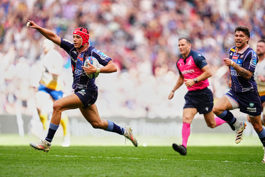 Bordeaux's Louis Bielle-Biarrey celebrates scoring a try during the European Champions Cup final rugby union match between Leinster and Bordeaux in Bilbao, Spain, Saturday, May 23, 2026. (AP Photo/Miguel Oses)