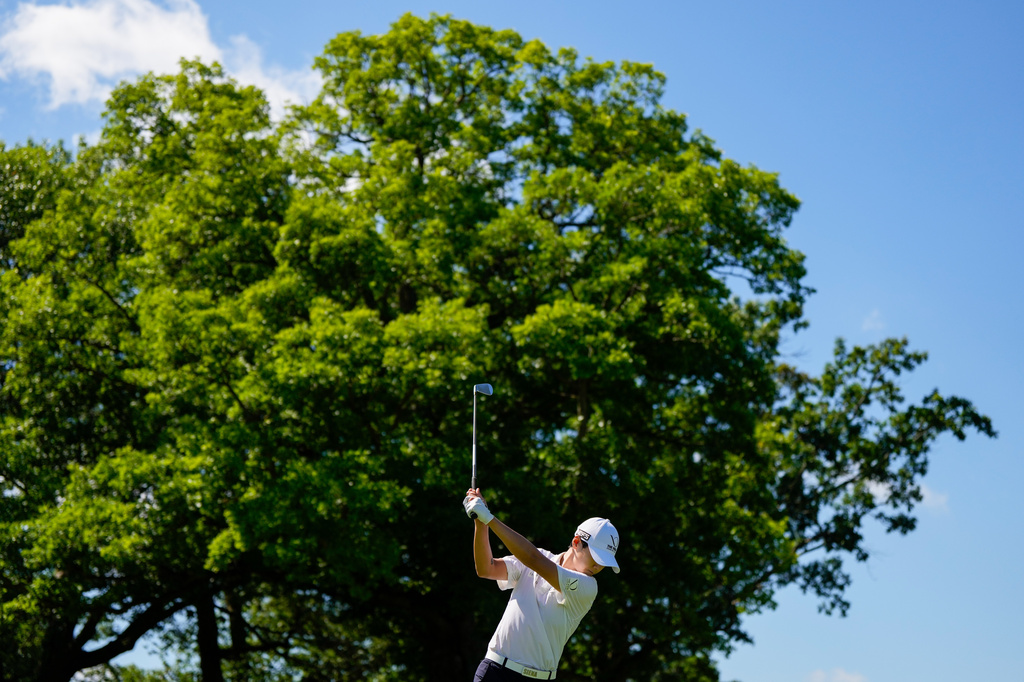 Sung Hyun Park, of South Korea, hits from the 17th tee during a practice round prior to the Women's PGA Championship golf tournament, Wednesday, June 24, 2026, in Chaska. (AP Photo/Matt York)