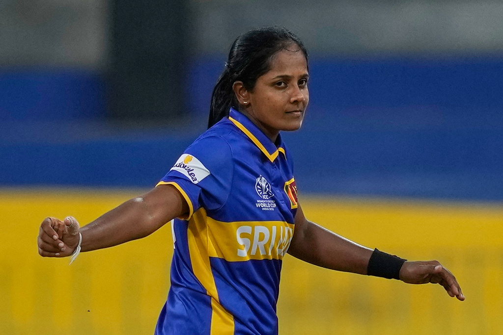 Sri Lanka's Inoka Ranaweera celebrates the wicket of England's Emma Lamb during the ICC Women's Cricket World Cup match between England and Sri Lanka at Premadasa Stadium in Colombo, Sri Lanka, Saturday, Oct. 11, 2025. (AP Photo/Eranga Jayawardena)