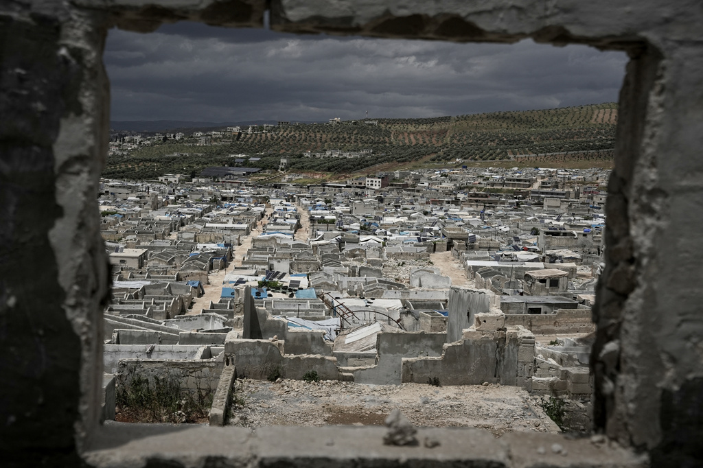 Al-Karama camp, built from scratch with light-brick structures covered with fabric to house internally displaced Syrians near the village of Atmeh, Idlib province, Syria, Tuesday, May 19, 2026.(AP Photo/Omar Albam)