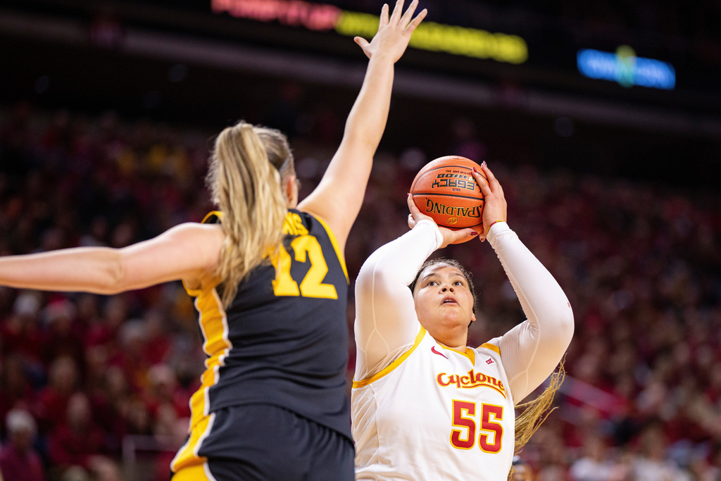Iowa State center Audi Crooks (55) shoots the ball during an NCAA college basketball game against Iowa in Ames, Iowa, Wednesday, Dec. 10, 2025. (Nick Rohlman/The Gazette via AP)