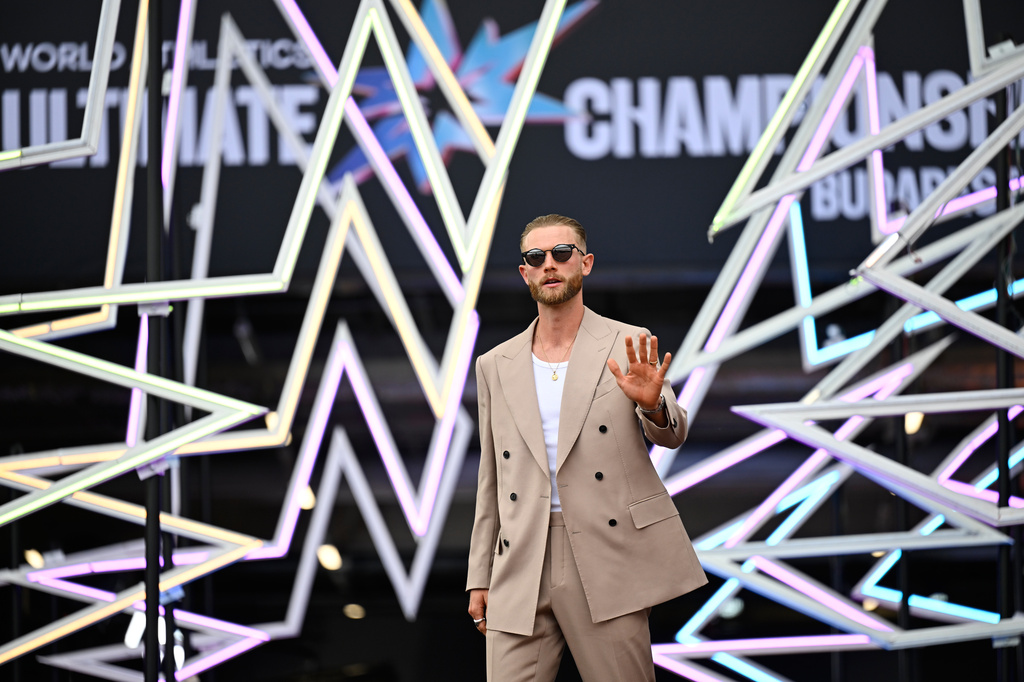 Josh Kerr of Britain poses on the red carpet during the formal opening of the World Athletics Ultimate Championship in Budapest, Hungary, Thursday, Sept. 10, 2026. (AP Photo/Denes Erdos)