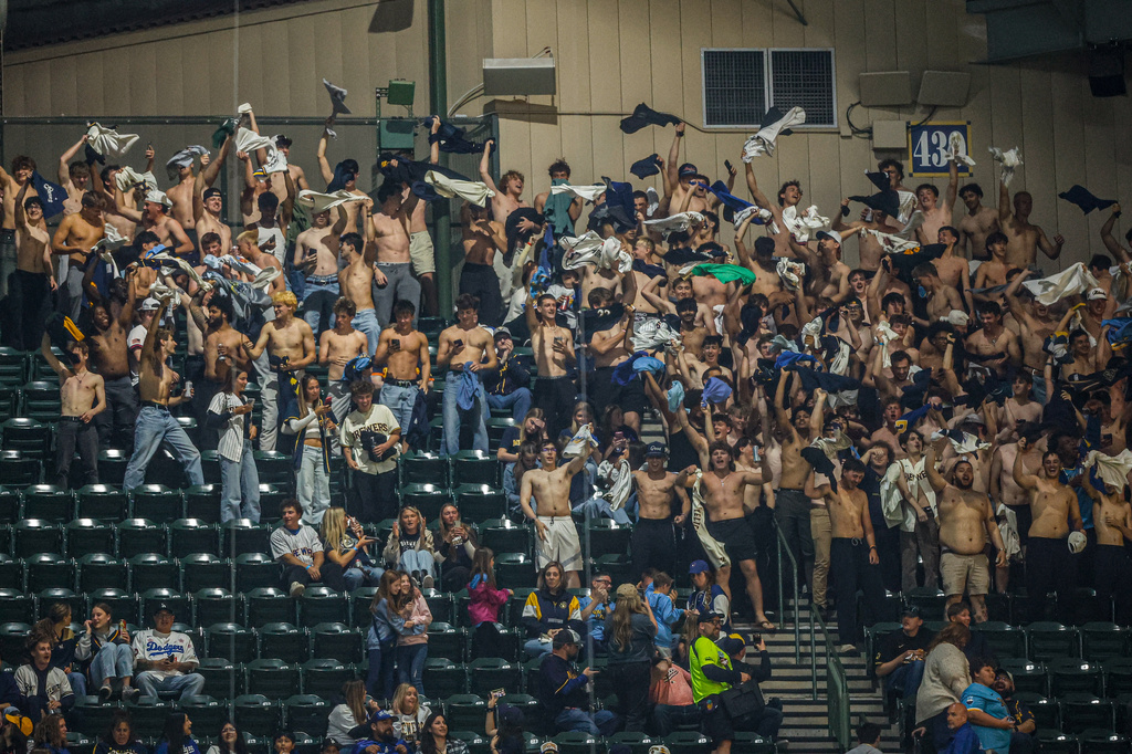 Milwaukee Brewer fans cheer during the fifth inning of a baseball game against the Los Angeles Dodgers, Friday, May 22, 2026, in Milwaukee. (AP Photo/Jeffrey Phelps)