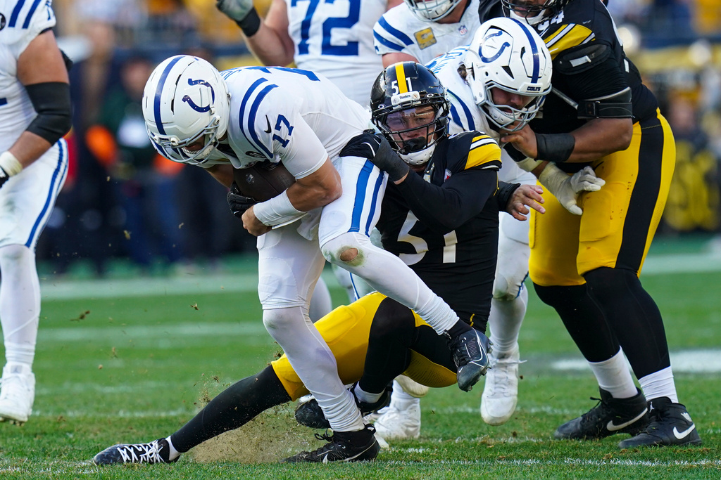Indianapolis Colts quarterback Daniel Jones (17) is tackled by Pittsburgh Steelers linebacker Nick Herbig (51) during the second half of an NFL football game in Pittsburgh, Sunday, Nov. 2, 2025. (AP Photo/Matt Freed)