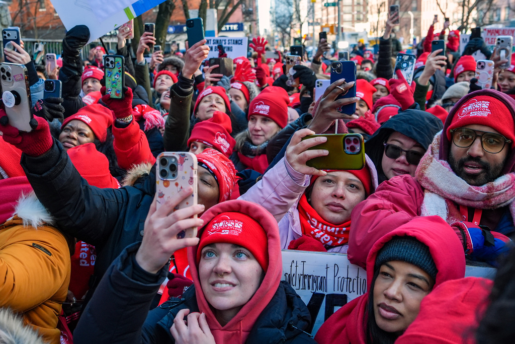 Members of the New York State Nurses Association union listen to Mayor Zohran Mamdani speak during.a picket outside Mount Sinai West Hospital, Tuesday, Jan. 20, 2026, in New York. (AP Photo/Ryan Murphy)