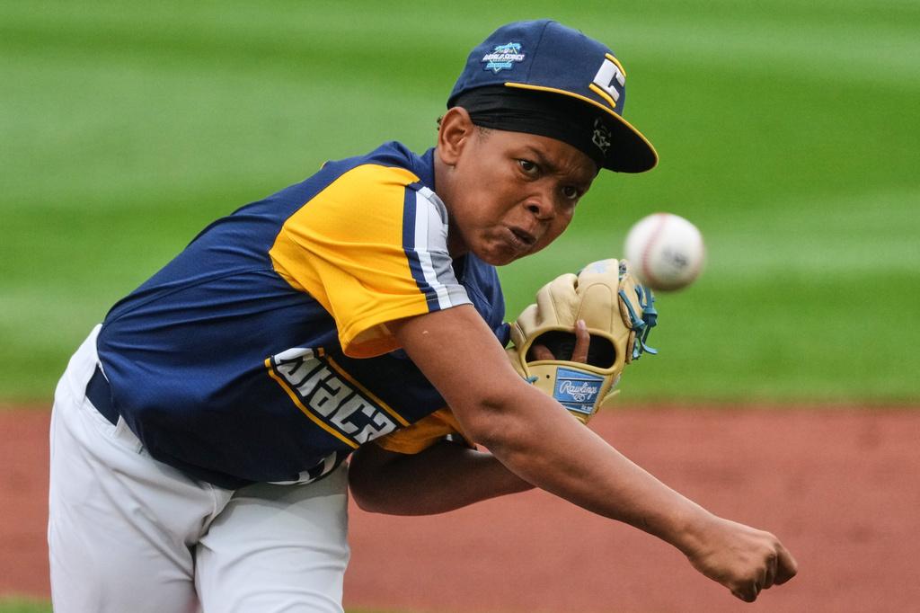 Curacao's Junensly De Windt delivers during the first inning of the Little League World Series Championship game against Henderson, Nev. in South Williamsport, Pa., Sunday, Aug. 30, 2026. (AP Photo/Gene J. Puskar)