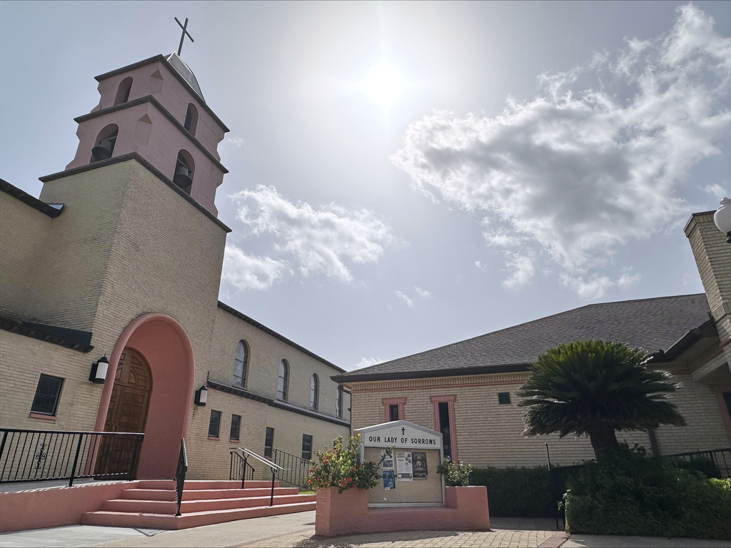 The sun beams over the Our Lady of Sorrows Church in McAllen, Texas, Monday, June 29, 2026. (AP Photo/Valerie Gonzalez)
