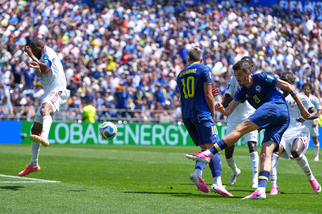 Bosnia's Ermin Mahmic (26) scores his side's third goal during the World Cup Group B soccer match between Bosnia and Qatar in Seattle Wednesday, June 24, 2026. (AP Photo/Manu Fernandez)