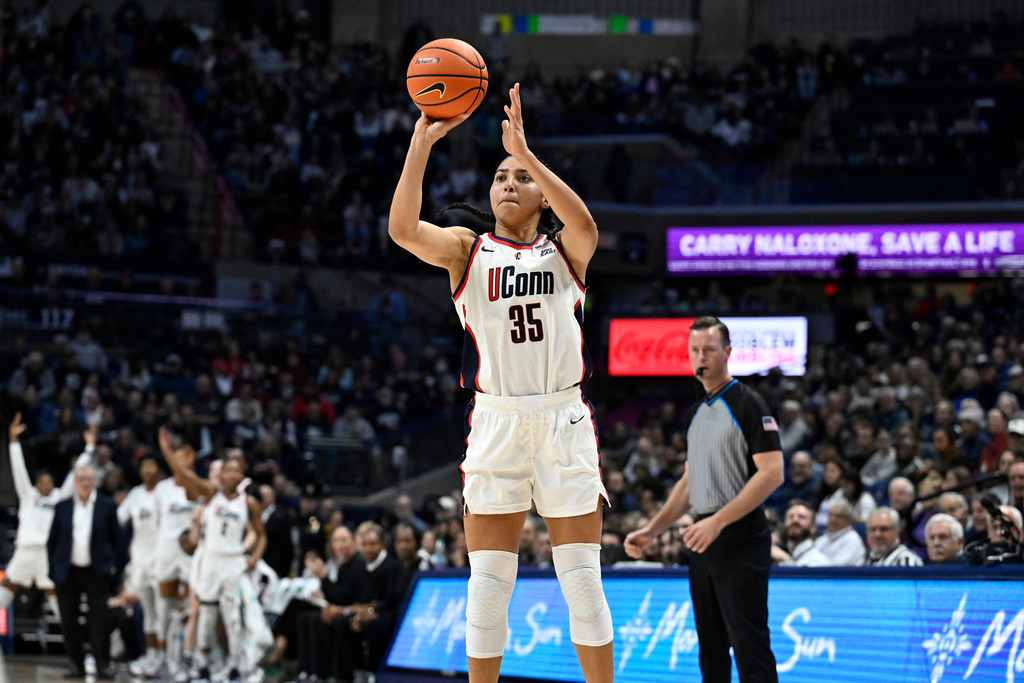 UConn guard Azzi Fudd (35) prepares to shoot a basket in the first half of an NCAA college basketball game against DePaul, Sunday, Dec. 7, 2025, in Storrs, Conn. (AP Photo/Jessica Hill)