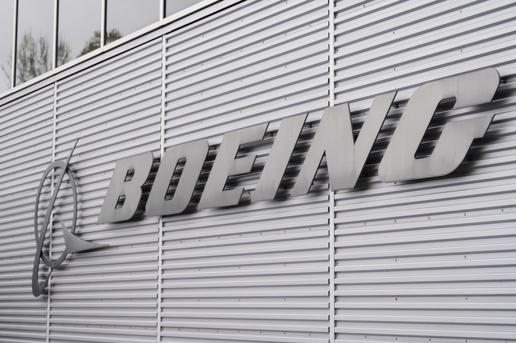 FILE - The Boeing logo is seen outside of Boeing's factory Wednesday, April 15, 2026, in Renton, Wash. (AP Photo/Lindsey Wasson, file)