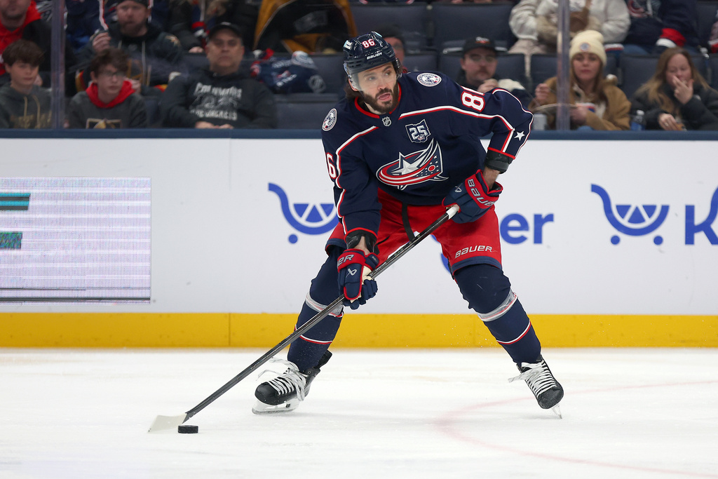 Columbus Blue Jackets right wing Kirill Marchenko (86) looks to pass during the first period of an NHL hockey game against the Vegas Golden Knights, Saturday, Dec. 13, 2025, in Columbus, Ohio. (AP Photo/Joe Maiorana)