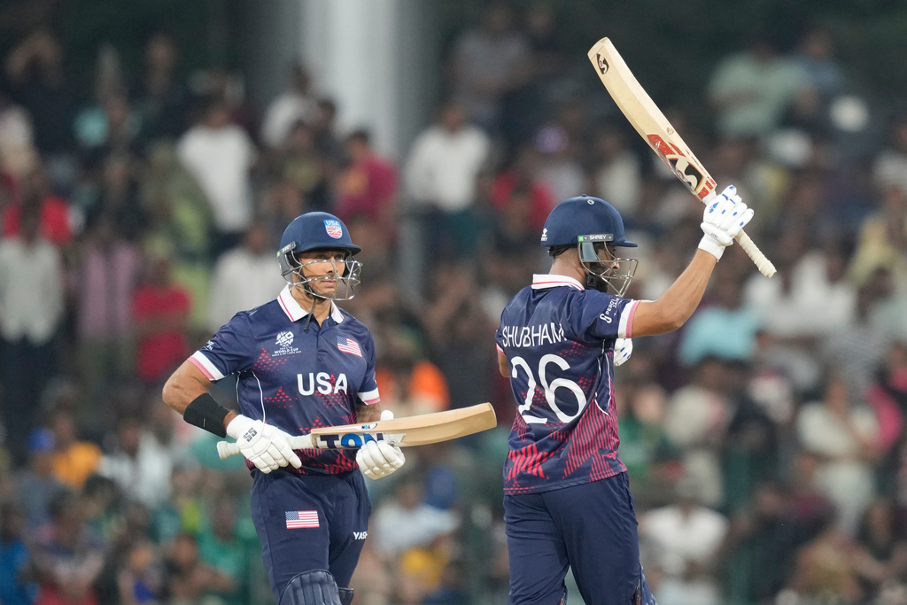 United States' Shubham Ranjane, right, celebrates his fifty runs during the T20 World Cup cricket match between Pakistan and the United States in Colombo, Sri Lanka, Tuesday, Feb. 10, 2026. (AP Photo/Eranga Jayawardena)