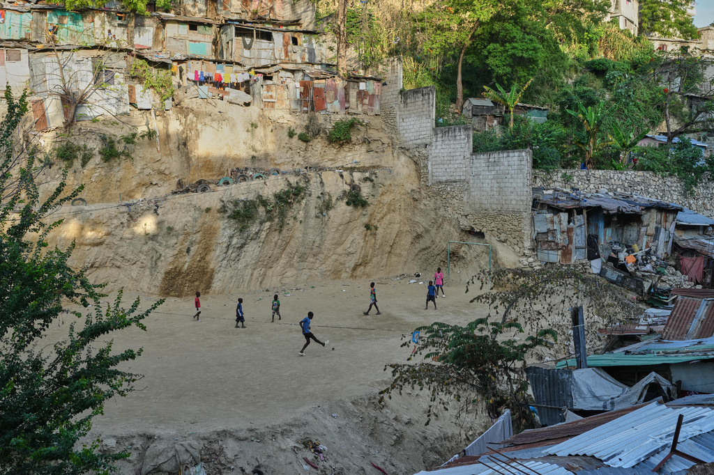 Children play soccer with a plastic ball in the Pétion-Ville neighborhood of Port-au-Prince, Haiti, Wednesday, May 27, 2026. (AP Photo/Odelyn Joseph)