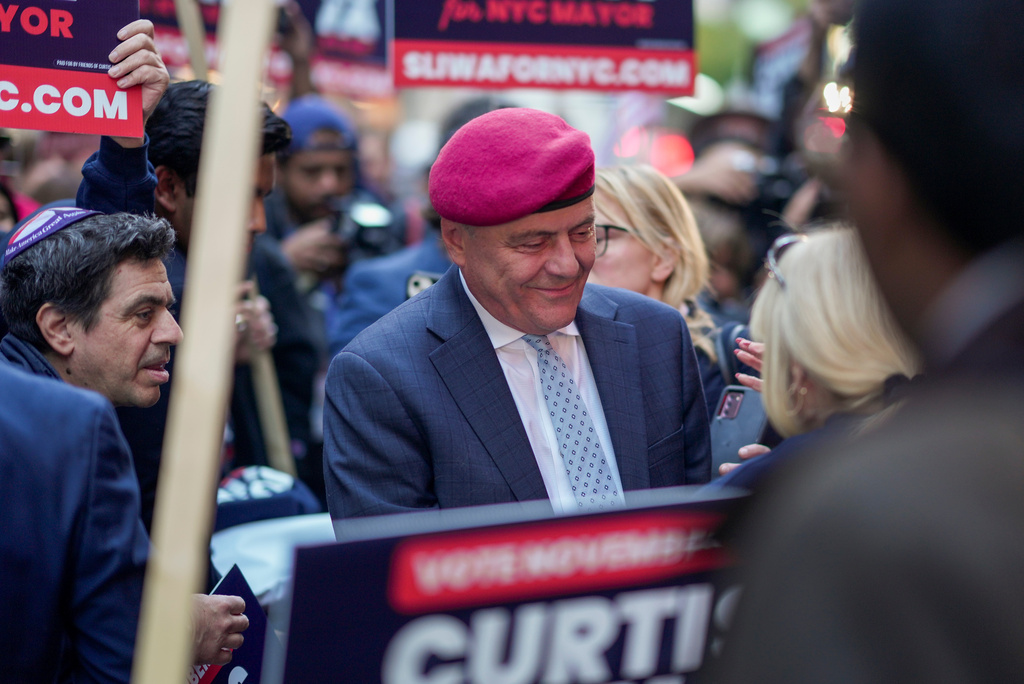 Republican candidate Curtis Sliwa greets supporters upon arriving to participate in a mayoral debate, Thursday, Oct. 16, 2025, in New York. (AP Photo/Angelina Katsanis)