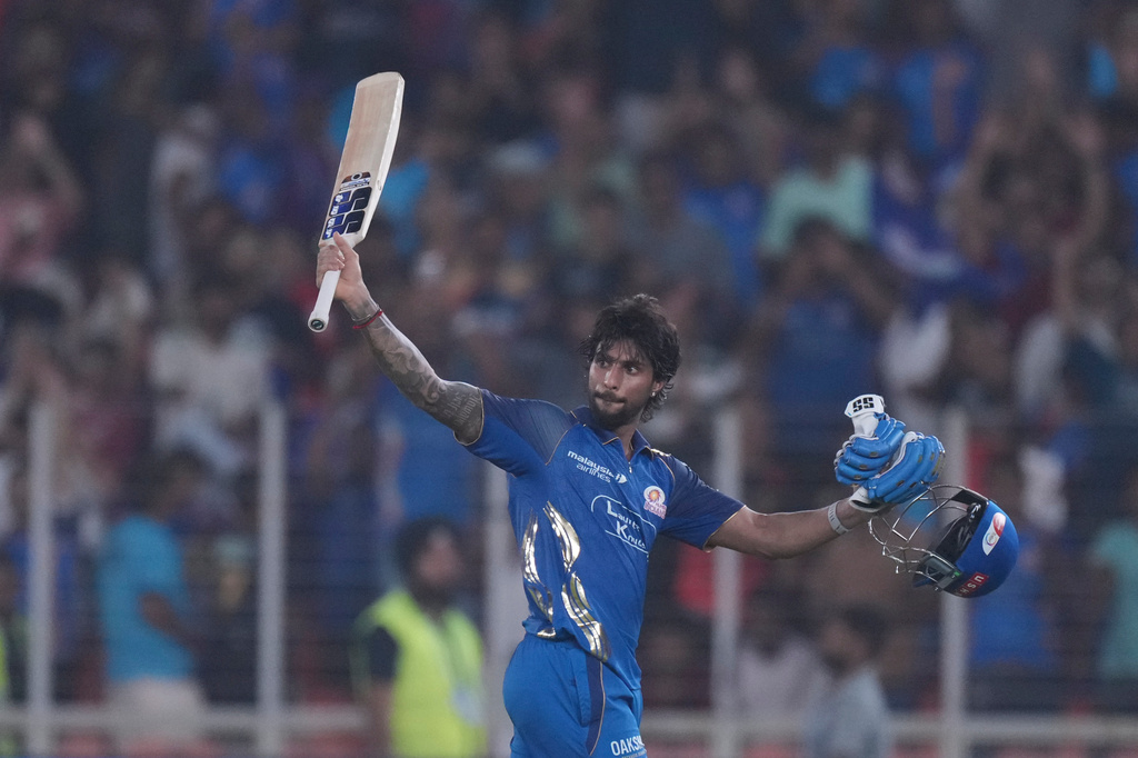 Mumbai Indians' Tilak Verma celebrates his century during the Indian Premier League cricket match between Gujarat Titans and Mumbai Indians in Ahmedabad, India, Monday, April 20, 2026.(AP Photo/ Ajit Solanki )
