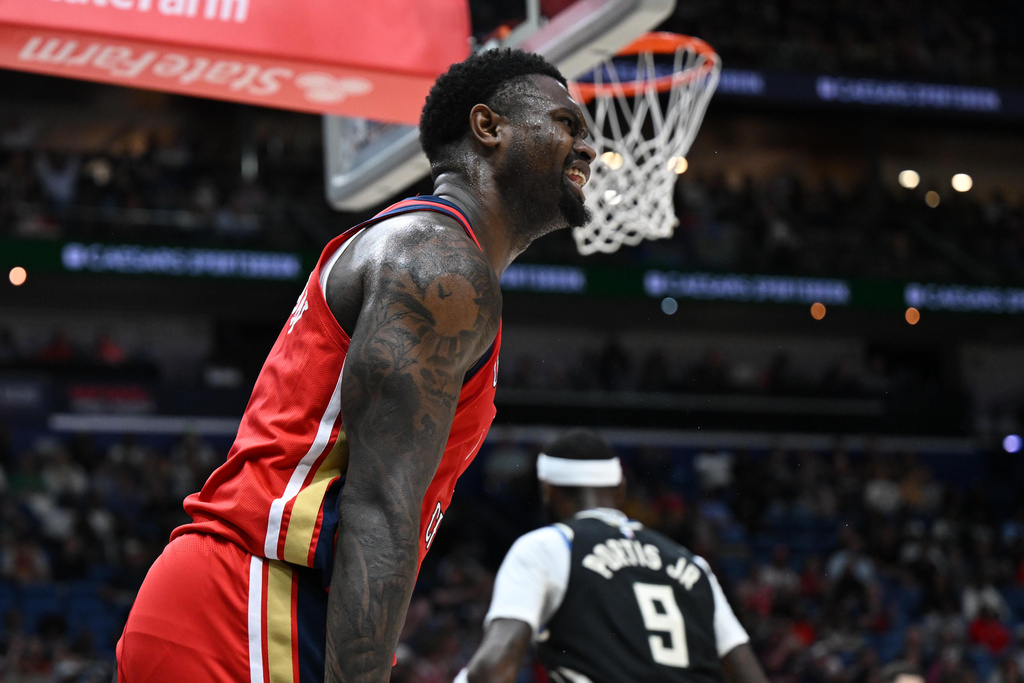 New Orleans Pelicans forward Zion Williamson celebrates after dunking in the first half of an NBA basketball game against the Milwaukee Bucks in New Orleans, Friday, Feb. 20, 2026. (AP Photo/Ella Hall)