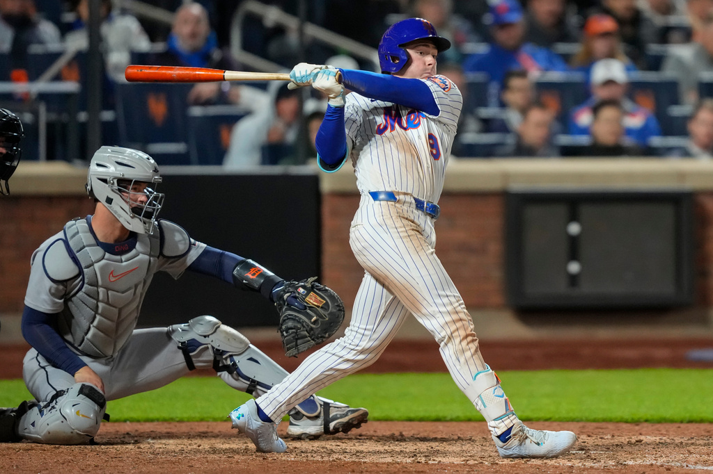 New York Mets' A.J. Ewing (9) hits an RBI triple during the seventh inning of a baseball game against the Detroit Tigers, Tuesday, May 12, 2026, in New York. (AP Photo/Yuki Iwamura)
