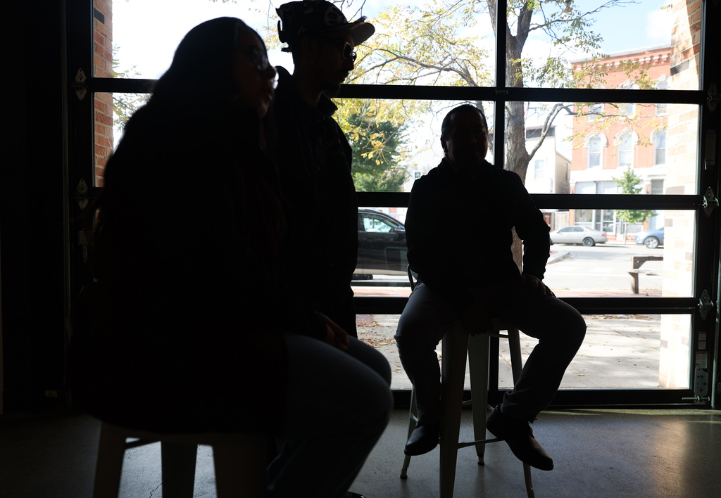 A baker in the historically Mexican-American Chicago neighborhood of Pilsen speaks during an interview at Vault Gallerie, Wednesday, Oct. 29, 2025. (AP Photo/Talia Sprague)