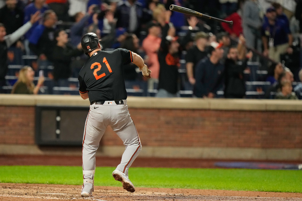 Baltimore Orioles' Pete Alonso throws his bat after hitting a solo home run during the ninth inning of a baseball game against the New York Mets, Tuesday, Sept. 15, 2026, in New York. (AP Photo/Seth Wenig)