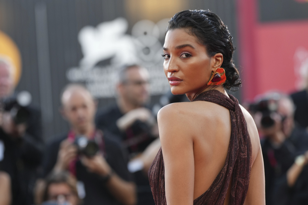 Indya Moore poses for photographers on the red carpet for the film 'Father Mother Sister Brother' during the 82nd edition of the Venice Film Festival in Venice, Italy, on Sunday, Aug. 31, 2025. (Photo by Alessandra Tarantino/Invision/AP)