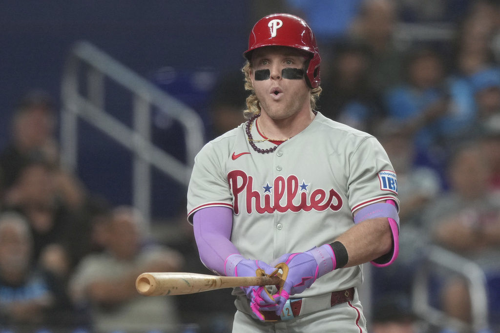 Philadelphia Phillies outfielder Harrison Bader (2) reacts after striking out during the fifth inning of a baseball game against the Miami Marlins Friday, Sept. 5, 2025, in Miami. (AP Photo/Marta Lavandier)