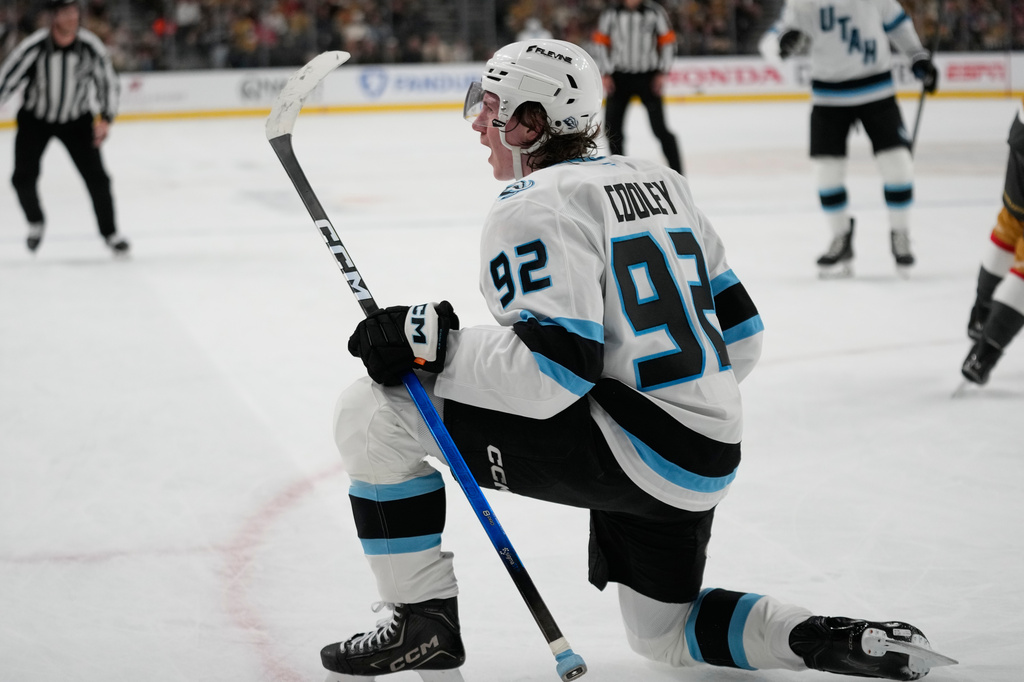 Utah Mammoth center Logan Cooley (92) celebrates after scoring against the Vegas Golden Knights during the first period in Game 1 of a first-round NHL hockey Stanley Cup playoff series Sunday, April 19, 2026, in Las Vegas. (AP Photo/John Locher)