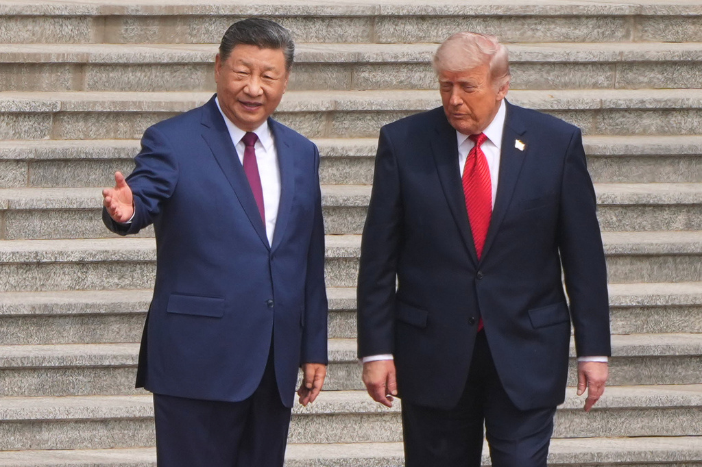 FILE - President Donald Trump participates in a welcome ceremony with China's President Xi Jinping at the Great Hall of the People, May 14, 2026, in Beijing. (AP Photo/Mark Schiefelbein, File)