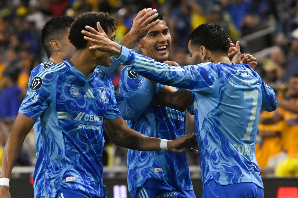 UANL Tigres forward Ángel Correa, right, celebrates his goal against Nashville SC with Francisco Reyes, second from right, and other team mates during the first half of an CONCACAF Champions Cup first leg semifinal soccer match Tuesday, April 28, 2026, in Nashville, Tenn. (AP Photo/John Amis)