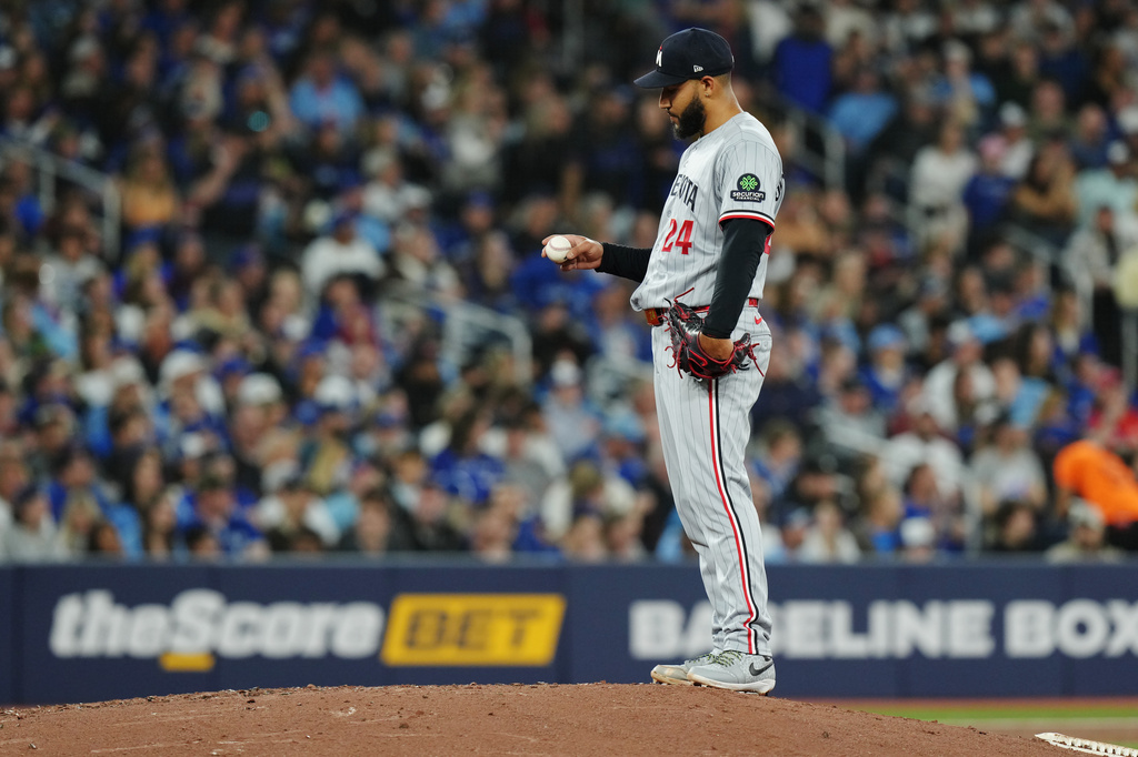 Minnesota Twins pitcher Simeon Woods Richardson reacts on the mound during fourth-inning baseball game action against the Toronto Blue Jays in Toronto, Friday, April 10, 2026. (Chris Young/The Canadian Press via AP)