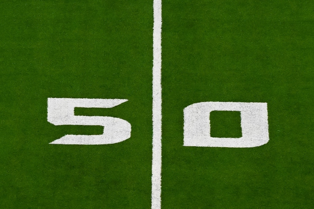FILE - A detail view of the 50 yard line prior to an NFL football game between the Detroit Lions and the Houston Texans, Sunday, Nov 10, 2024 in Houston. (AP Photo/Maria Lysaker, File)
