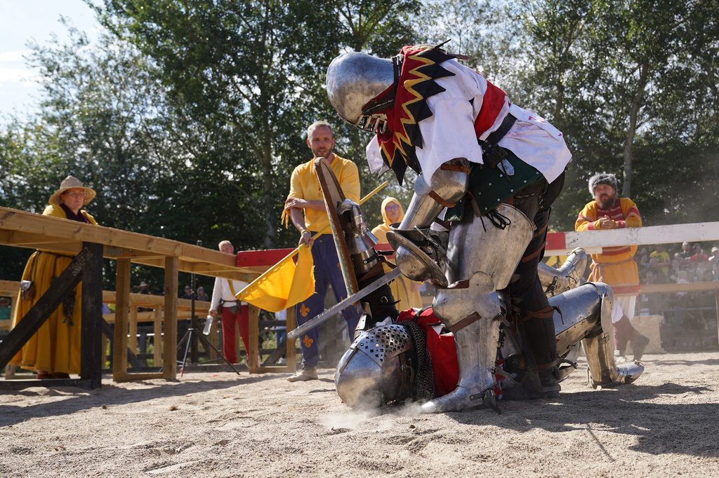 Two fighters battle during the International Medieval Combat Federation's World Championship at Spottrup Castle, in Spottrup, Denmark, Thursday, July 23, 2026. (AP Photo/James Brooks)